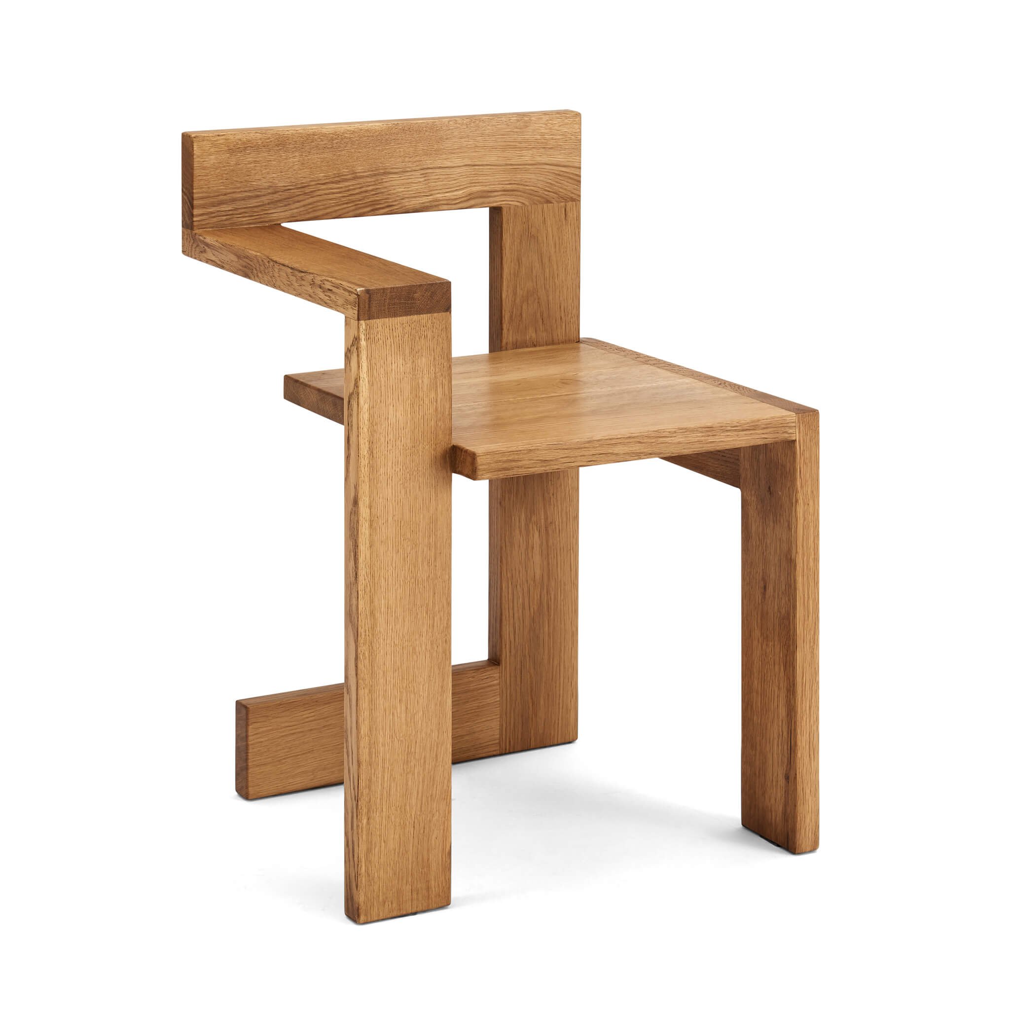 A wooden chair with a flat seat and backrest, showing a modern blocky design.