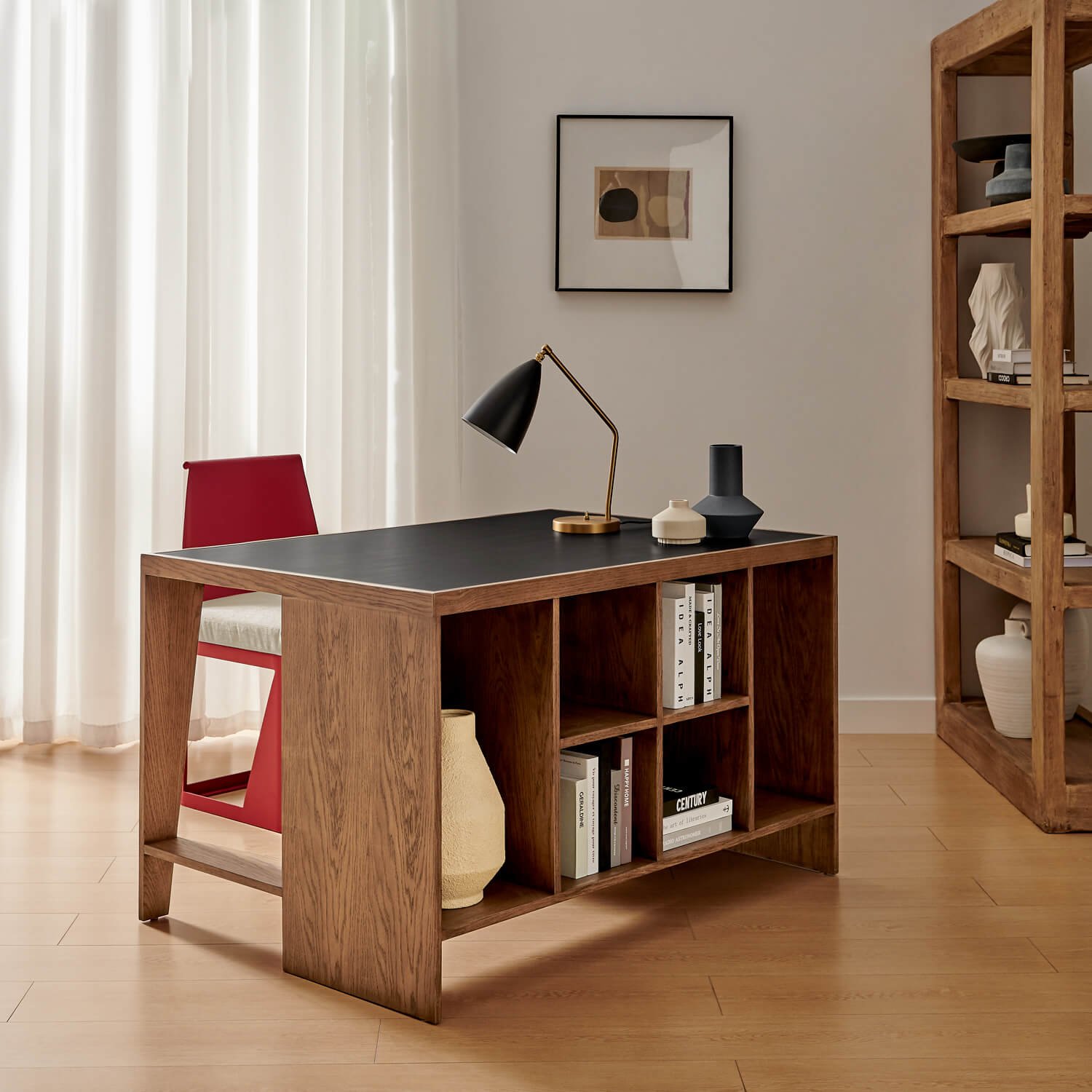 Side view of desk showing edge and leg design with black top.