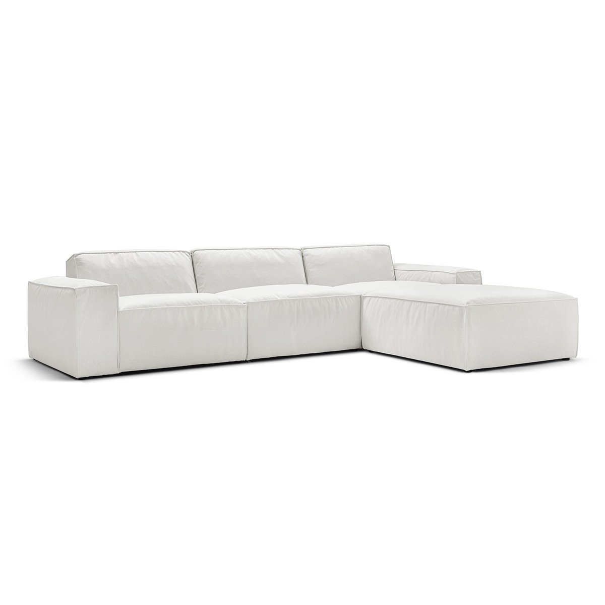 Side profile of a white sofa with chaise extension, minimalistic