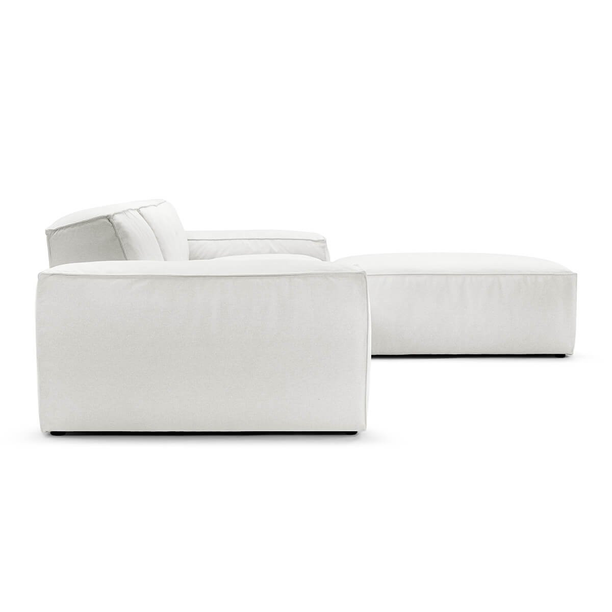 Front view of white sofa with chaise extension on the right
