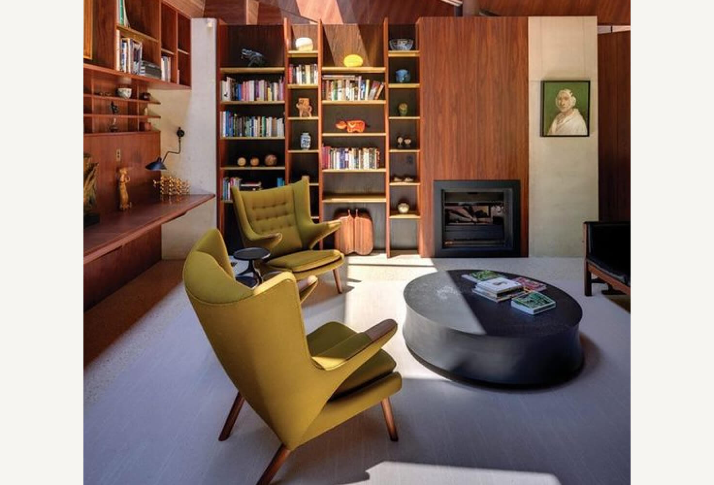 Photograph of a Danish Modern Style home library with mid-century furnishings and decor.