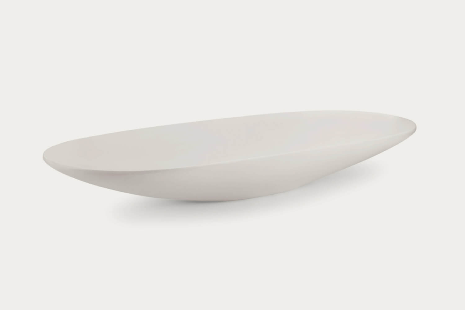 Remy Modern Oval Bowl Concrete Coffee Table by Eternity Modern. 