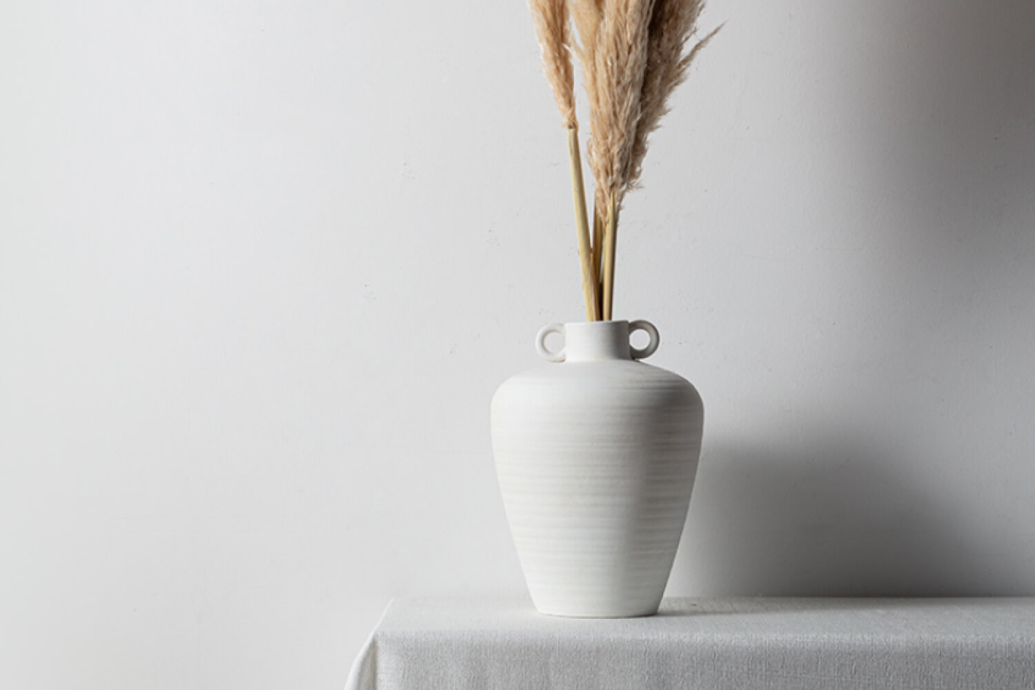 Meadow Decorative Tall White Nordic Ceramic Vessel Vase With Handles by Eternity Modern.